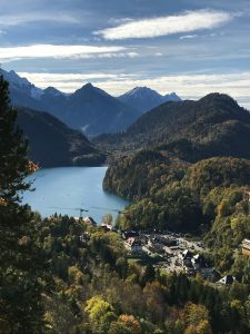 Picturesque landscape of mountains, lake, and town in Bavaria.